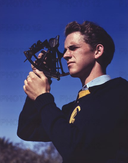 Thomas Graham, Member of Victory Corps at Polytechnic High School, Learning to use Sextant to Determine Longitude and Latitude, Los Angeles, California, USA, Alfred T. Palmer for Office of War Information, September 1942