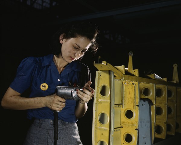 Female Worker Operating Hand Drill on Horizontal Stabilizer for Vultee "Vengeance" A-31 Dive Bomber, Nashville, Tennessee, USA, Alfred T. Palmer for Office of War Information, February, 1943