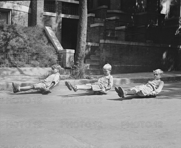 Three Boys on Scooter Skates, National Photo Company, September 1922