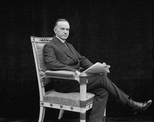 U.S. President Calvin Coolidge, Portrait with Newspaper, Washington DC, USA, National Photo Company, May 1924