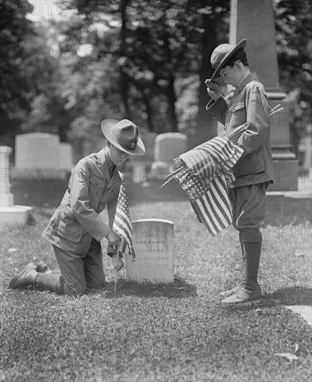 Two Boy Scouts putting American Flags at Grave of 14 Unknown Soldiers and Sailors from War of 1812, Arlington National Cemetery, Arlington, Virginia, USA, National Photo Company, May 1925
