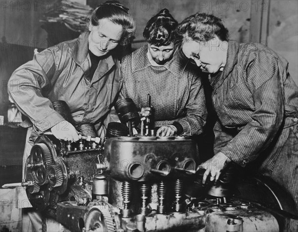 Three Women Repairing Car Engine during World War I, Los Angeles, California, USA, Bain News Service, circa 1918