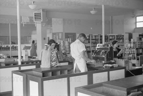 Cashier and Customers in Cooperative Market, Greenhills, Ohio, USA, John Vachon for Farm Security Administration, October 1938