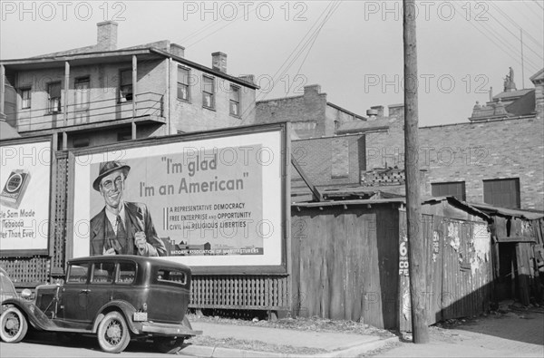 National Association of Managers Billboard, Dubuque, Iowa, USA, John Vachon for Farm Security Administration, April 1940