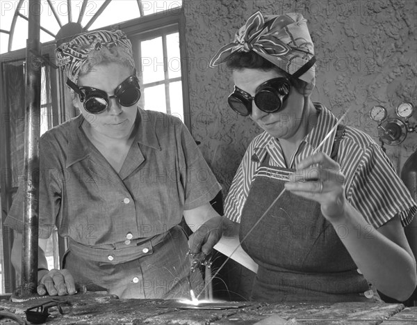 Two Woman Welding while Being Trained in Aircraft Construction Class during WWII, De Land, Florida, Howard R. Hollem for Office of War Information, April 1942