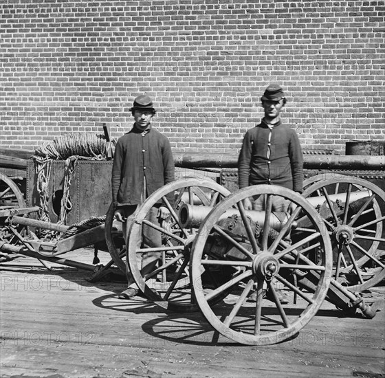 Confederate Soldiers with Brass Mountain Howitzers, Richmond, Virginia, USA, by George N. Barnard, April 1865