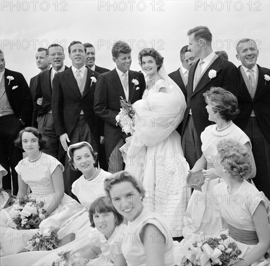 Jackie Bouvier Kennedy and John F. Kennedy, in Wedding Attire, with Members of Wedding Party, Newport, Rhode Island, USA, by Toni Frissell, September 12, 1953