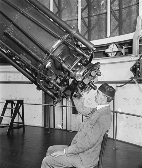 Professor H.E. Burton Looking through Telescope, Close-Up, U.S Naval Observatory, Washington DC, USA, National Photo Company, August 1929