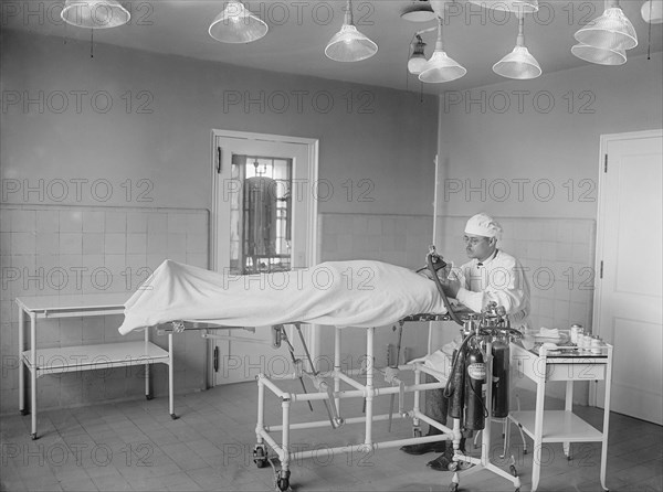 Anesthesiologist with Patient during Surgery, USA, National Photo Company, 1922