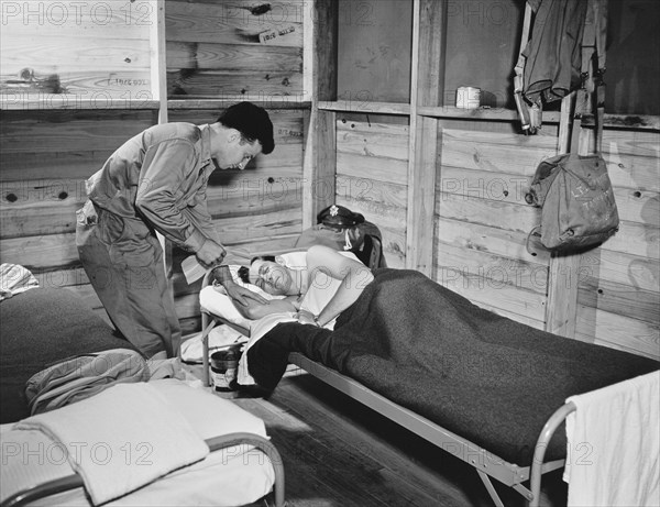 Pilot of U.S. Army Air Transport Command Being Awakened to Receive Orders, David Eisendrath for Office of War Information, 1943