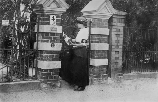 Female Mail Carrier delivering Mail during World War I, Berlin, Germany, Bain News Service, 1915