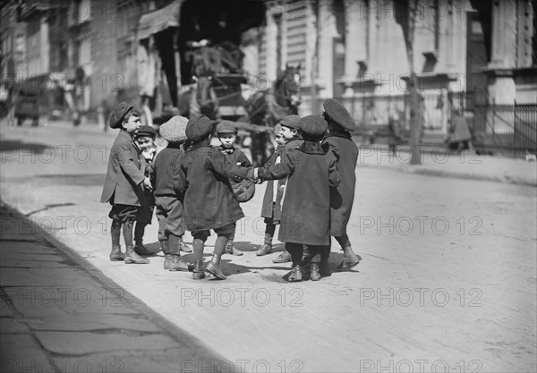 Group of Children Playing in Street, New York City, New York, USA, Bain News Service, April 1909