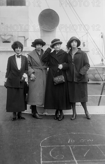 Physicist Marie Curie (2nd Right) Standing with her daughters Irene and Eve, and Mrs. William B. Maloney, on RMS OIympic, Arriving in New York City, New York, USA, to Raise Funds for Radium Research, Bain News Service, 1921