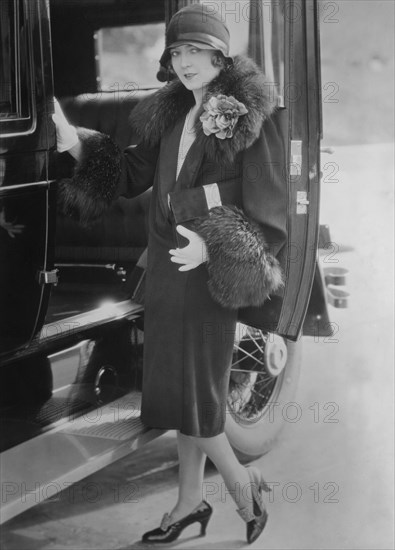Actress Vilma Banky, Fashion Portrait near Car, Bain News Service, 1927