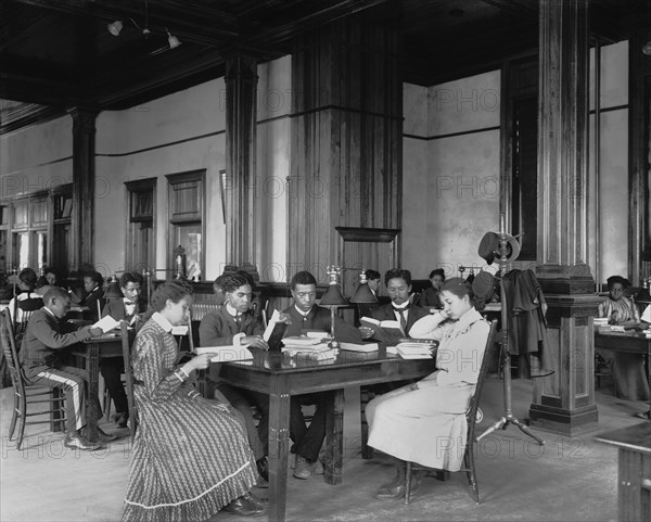 Male and Female Students Reading at Tables in Library, Tuskegee Institute, Tuskegee, Alabama, USA, by Frances Benjamin Johnson, 1902