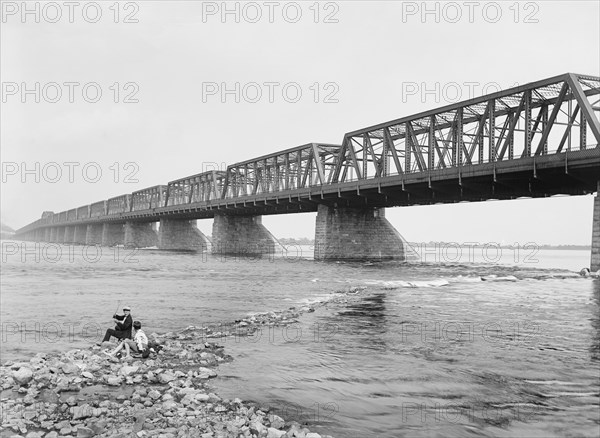 Two People Fishing near Victoria Jubilee Bridge, Montreal, Quebec, Canada, Detroit Publishing Company, 1900