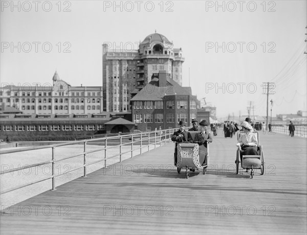 Roller Chairs on Boardwalk, Atlantic City, New Jersey, USA, Detroit Publishing Company, 1900