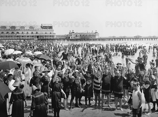 Crowd with Hands up on Beach, Atlantic City, New Jersey, USA, Detroit Publishing Company, 1910