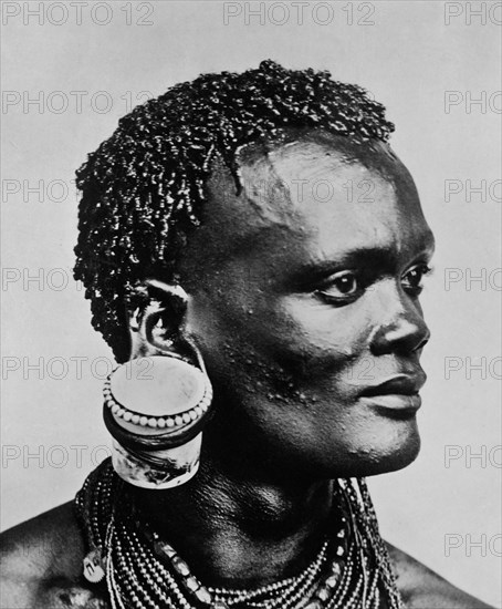 African Man with Jam Pot Hanging from Ear, Kenya, 1900