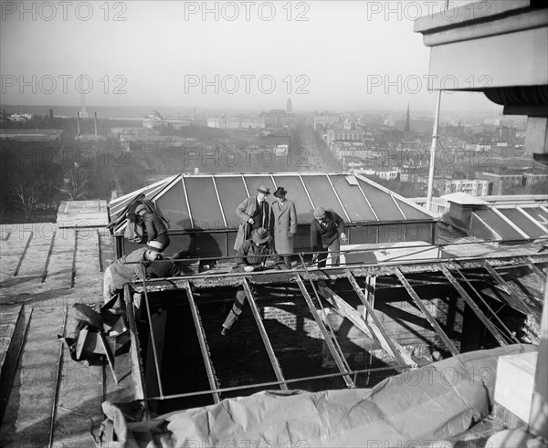 Group of Men Examining Damage to Roof of U.S. Capitol Building after Fire, Washington DC, USA, Harris & Ewing, January 1930