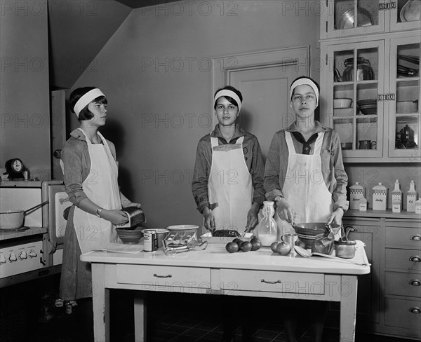Girl Scouts Preparing Food in Kitchen, Harris & Ewing, 1931