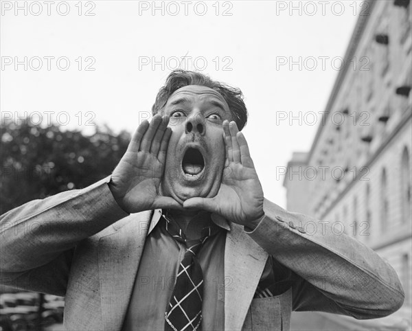 Congressman Robert L. Mouton of Louisiana practicing his Hog Calling on Capitol Steps, Washington DC, USA, Harris & Ewing, June 1937