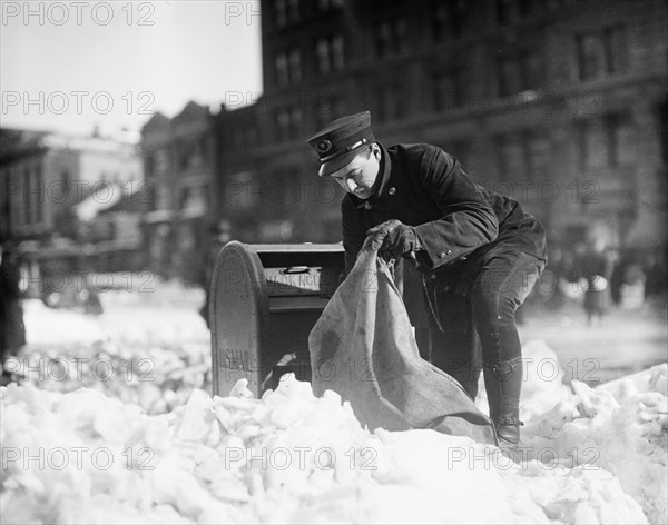 Mailman Collecting Mail from Mailbox after Blizzard, Washington DC, USA, Harris and Ewing, January 1922