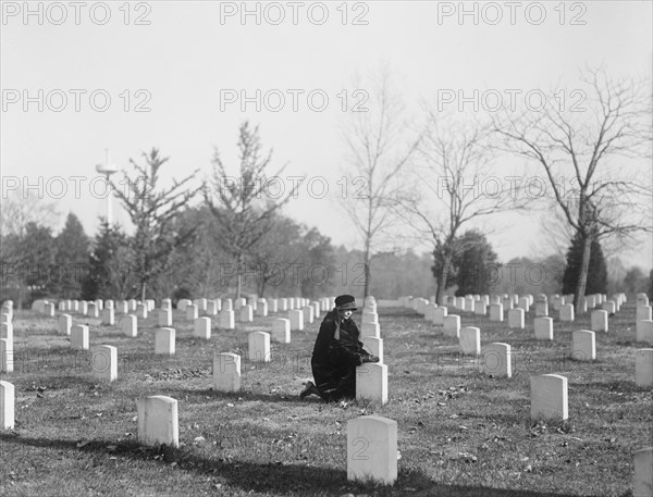 Woman Kneeling at Gravestone, Arlington National Cemetery, Arlington, Virginia, USA, Harris & Ewing, 1922