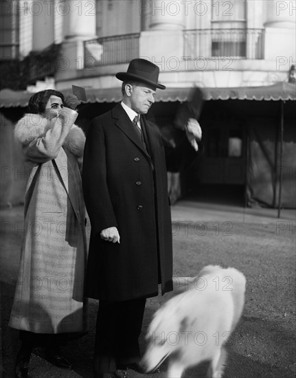 U.S. President Calvin Coolidge and First Lady Grace Coolidge viewing Solar Eclipse from White House Lawn, Washington DC, USA, Harris & Ewing, January 24, 1925