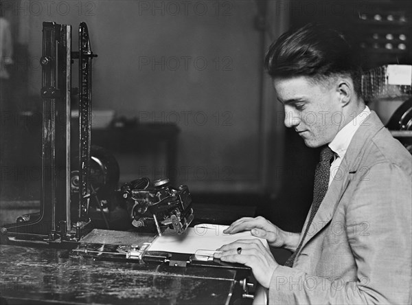 Worker Operating Addressing Machine, Treasury Department, Washington DC, USA, Harris & Ewing, 1918