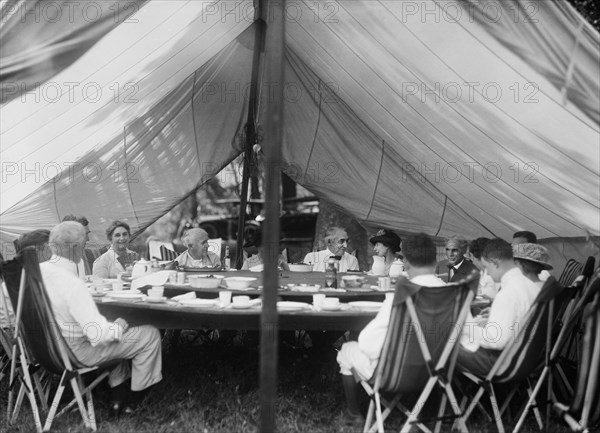 Thomas Edison, U.S. President Warren Harding, Henry Ford, and Families Having Lunch under Tent at Campsite, Maryland, USA, Harris & Ewing, 1921