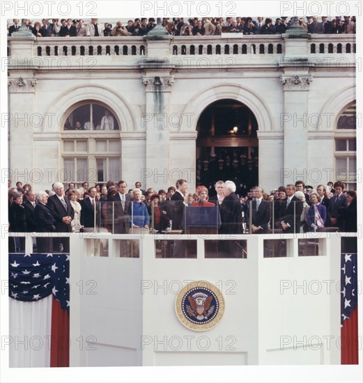 Chief Justice Warren E. Burger administering the oath of office to Ronald Reagan on the east portico of the U.S. Capitol, Washington DC, USA, Architect of the Capitol, January 20, 1981