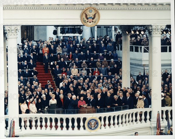 Chief Justice Earl Warren administering the oath of office to Richard M. Nixon on the east portico of the U.S. Capitol, Washington DC, USA, Architect of the Capitol, January 20, 1969