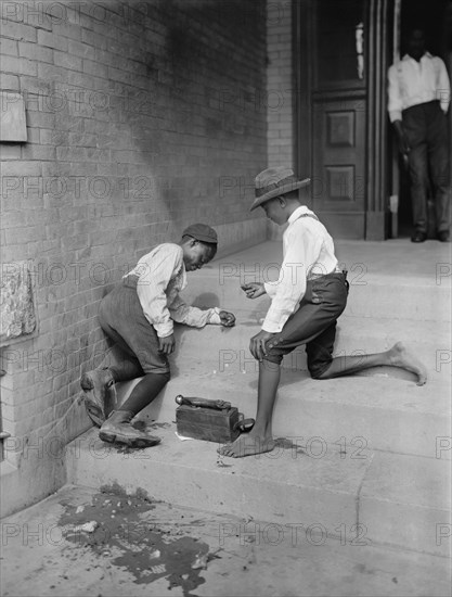 Two Boys Playing Game of Dice on Porch Steps, Detroit Publishing Company, 1901