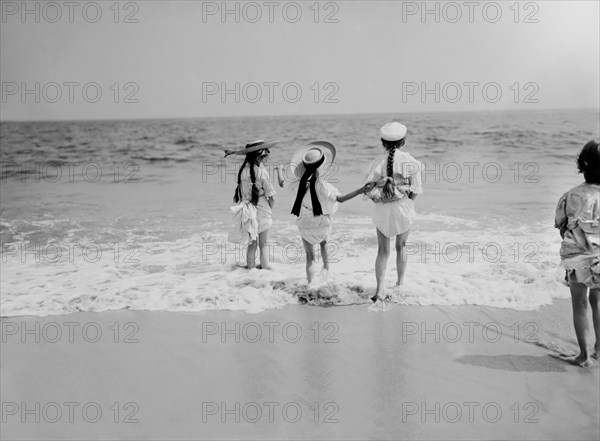 Three Young Girls Wading into Water, Coney Island, New York, USA, Detroit Publishing Company, 1905