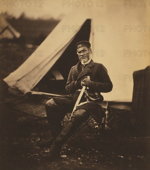 British General Mottram Andrews, 28th (North Gloucestershire) Regiment of Foot, Full-length Portrait Wearing Uniform, Seated Holding Sword in front of Military Tent, Crimean War, Crimea, Ukraine, by Roger Fenton, 1855