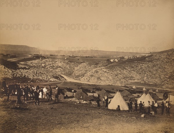 British Major Brandling's Troop, Encampment of Horse Artillery, showing Soldiers, Huts and Bell Tents, during Crimean War, near Kadikoi, Crimea, Ukraine, by Roger Fenton, 1855