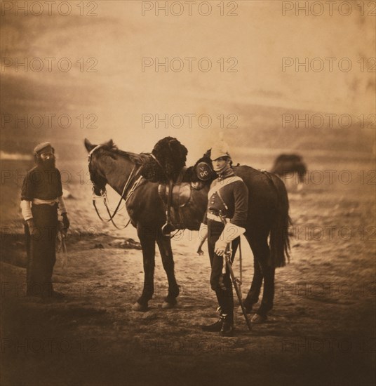 British Lieutenant Temple Godman, 5th Dragoon Guards, Full-Length Portrait Standing with Horse and Servant, Crimean War, Crimea, Ukraine, by Roger Fenton, 1855