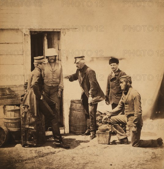 British Lieutenant-General Henry William Barnard, facing left, Gesturing toward Captain Barnard while Surrounded by Staff in front of Wood Building, Crimean War, Crimea, Ukraine, by Roger Fenton, 1855