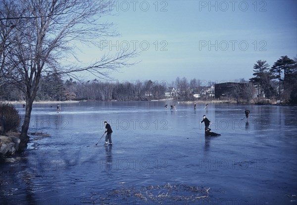 Group of people Ice Skating, Brockton, Massachusetts, USA, Jack Delano for Farm Security Administration - Office of War Information, December 1940