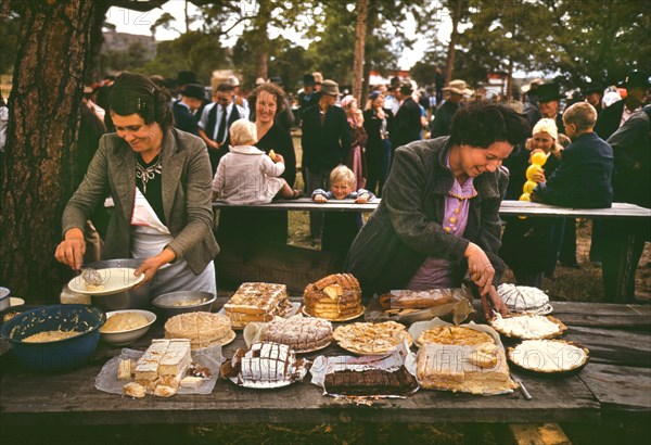 Two Women Getting Ready to Serve Dessert at Town Fair, Pie Town, New Mexico, USA, Russell Lee for Farm Security Administration - Office of War Information, October 1940