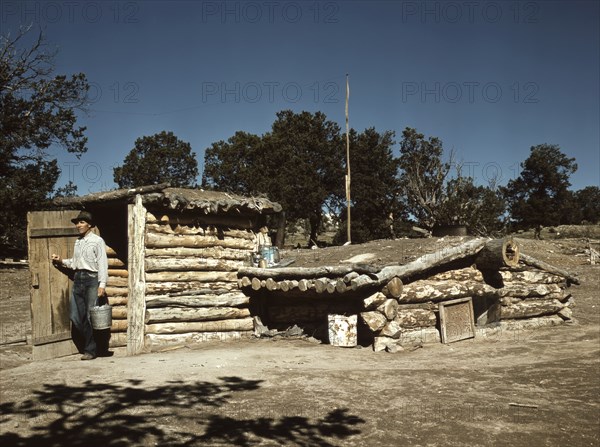 Mr. Leatherman, Homesteader, Coming out of his Dugout Home, Pie Town, New Mexico, USA, Russell Lee for Farm Security Administration - Office of War Information, September 1940