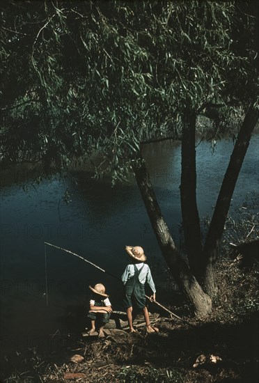 Two Cajun Boys Fishing in Bayou, Schriever, Terrabonne Parish, Louisiana, USA, Marion Post Wolcott for Farm Security Administration, June 1940