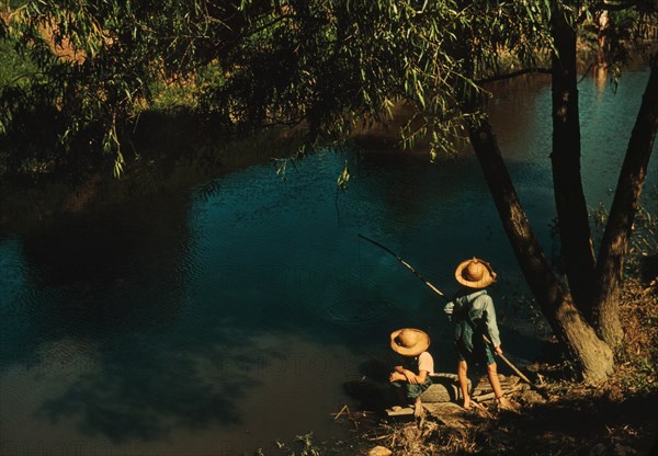 Two Cajun Boys Fishing in Bayou, Schriever, Terrabonne Parish, Louisiana, USA, Marion Post Wolcott for Farm Security Administration, June 1940