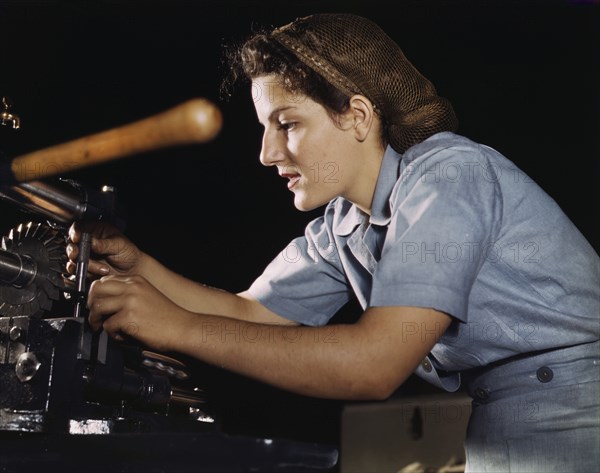 Mary Louise Stepan, 21 years old, Working on Transport Parts in Hand Mill, Consolidated Aircraft Corp., Fort Worth, Texas, USA, Howard R. Hollem for Office of War Information, October 1942