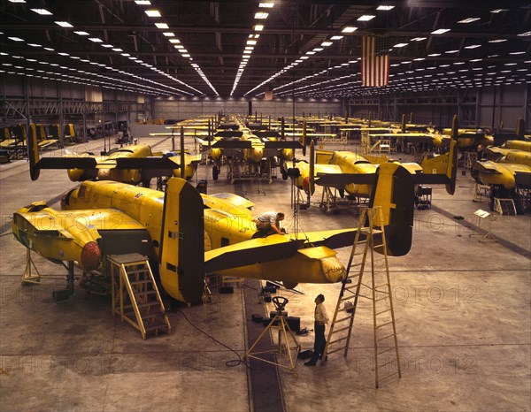 Workers Assembling B-25 Bombers, North American Aviation, Kansas City, Kansas, USA, Alfred T. Palmer for Office of War Information, October 1942