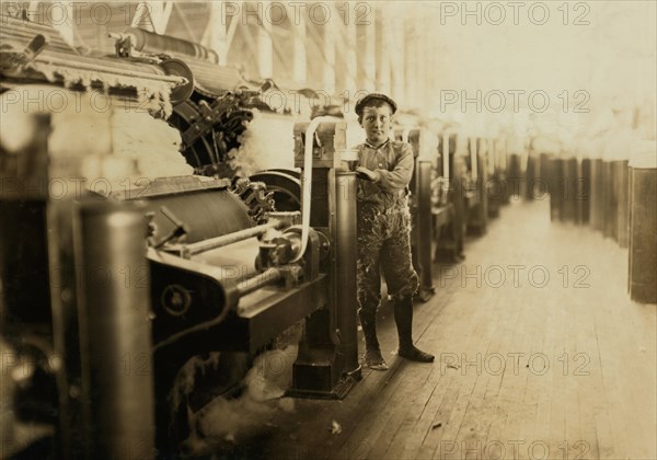 Young Sweeper near Carding Machines, Lincoln Cotton Mills, Evansville, Indiana, USA, Lewis Hine for National Child Labor Committee, October 1908