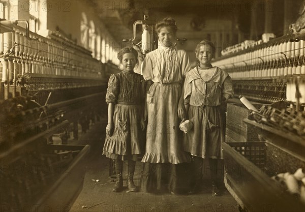 Three Young Workers, Girl on Left said she was 10 years old, girl on Right said she was 12, Rhodes Manufacturing Company, Lincolnton, North Carolina, USA, Lewis Hine for National Child Labor Committee, November 1908