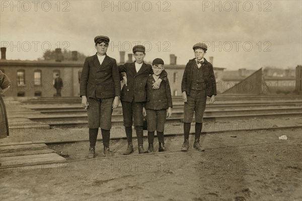 Four Young Boys Employed at Great Falls Manufacturing Company, Full-Length Portrait, Somersworth, New Hampshire, USA, Lewis Hine for National Child Labor Committee, May 1909