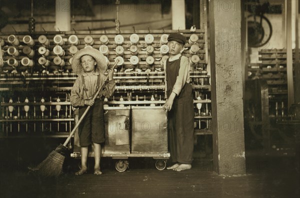 Ronald Webb, 12-year-old Doffer Boy, Frank Robinson, 7-year-old Sweeper, Full-Length Portrait in Cotton Mills, Roanoke Virginia, USA, Lewis Hine for National Child Labor Committee, May 1911